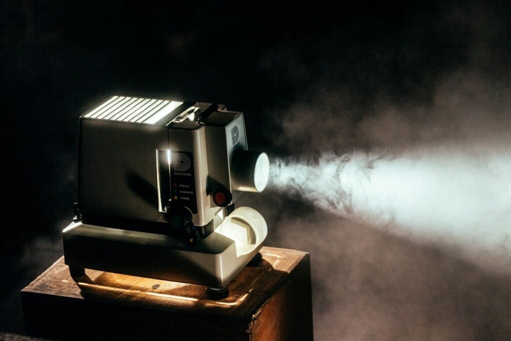 Vintage film projector in a dark cinema