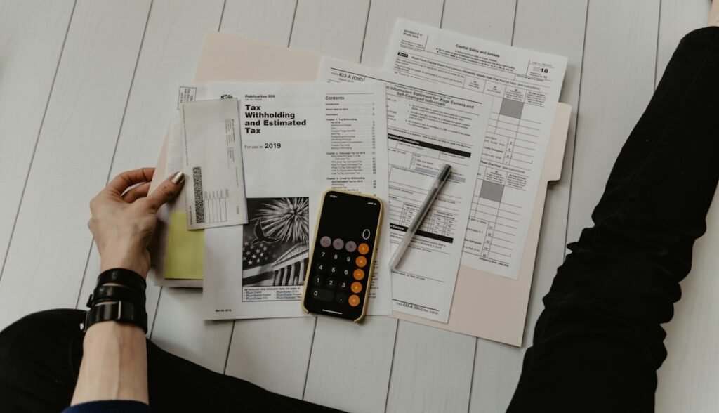 Calculator and financial documents for budgeting