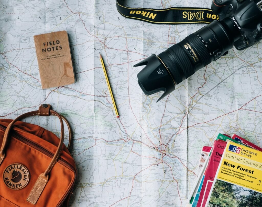 Traveller planning a journey with a map