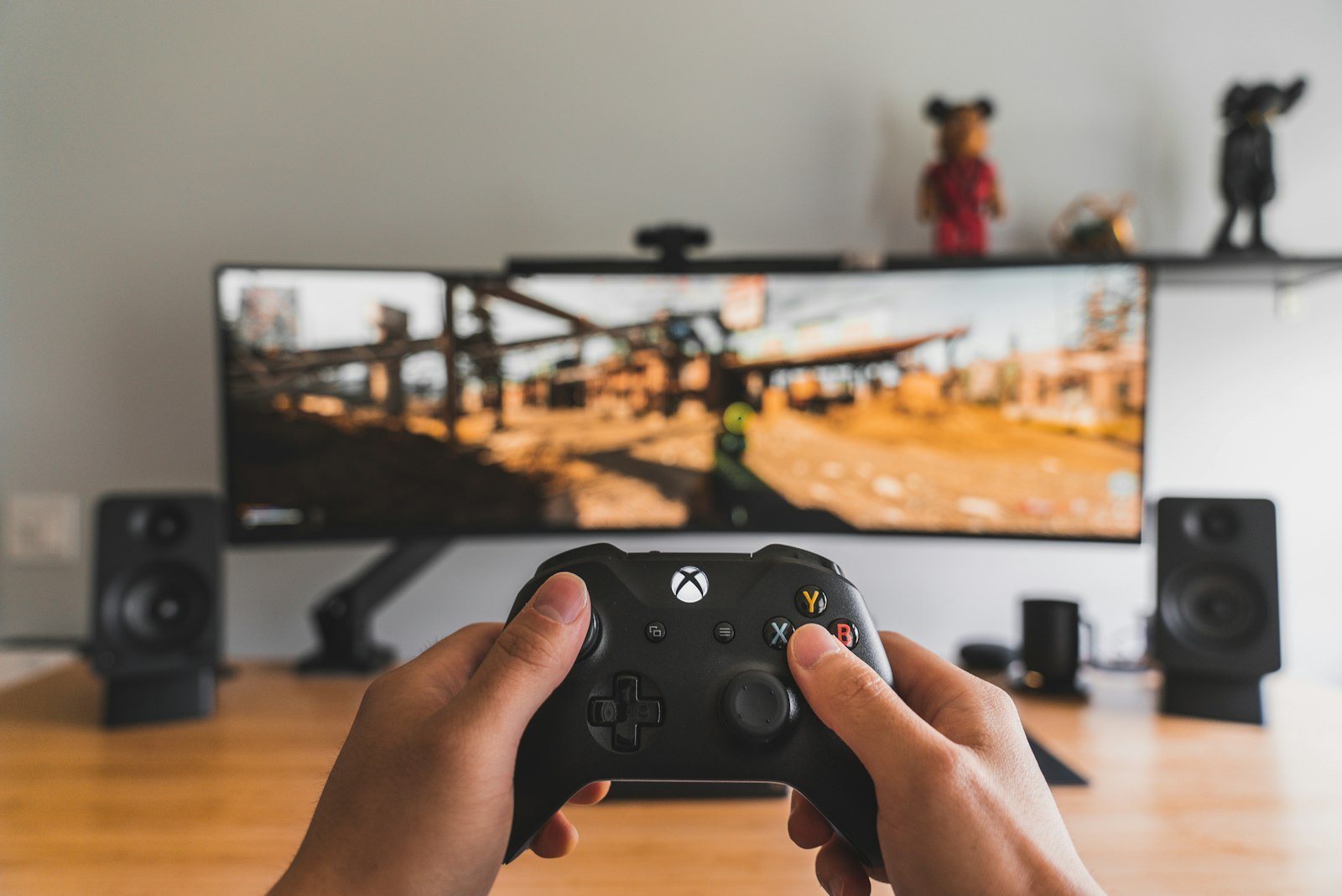 Beginner gamer applying essential gaming tips for beginners with a controller
